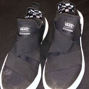 SOLD Black Vans Slip Ons